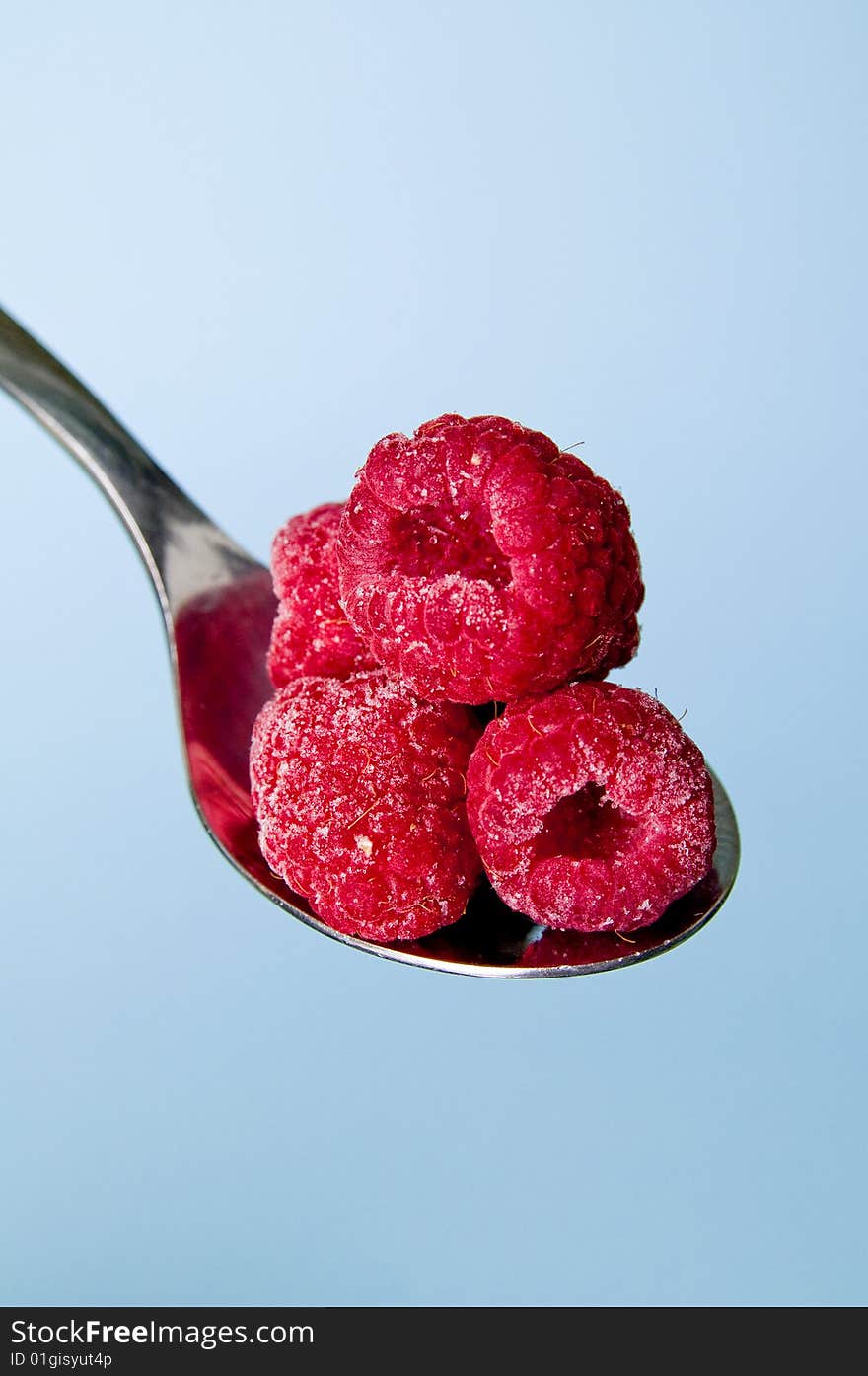 Raspberries on a spoon