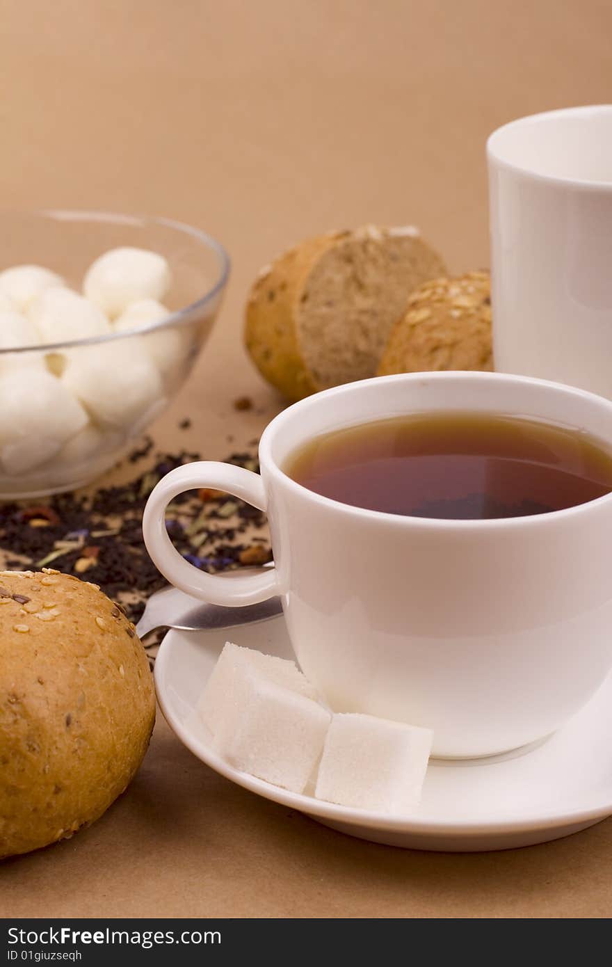 Cup of tea, mozzarella and bread closeup