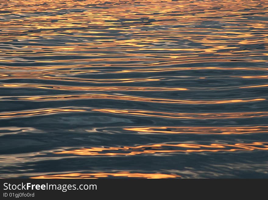 Streaks Of Gold On The Water