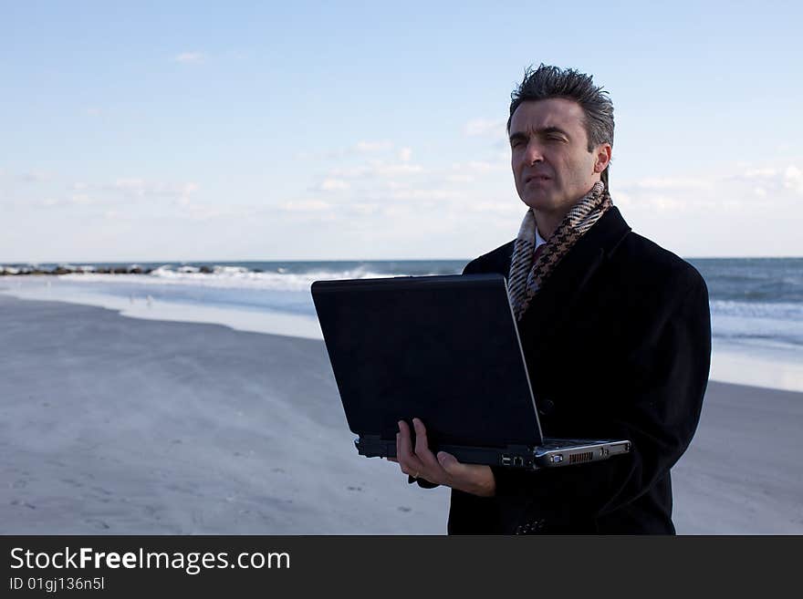 Businessman on the beach