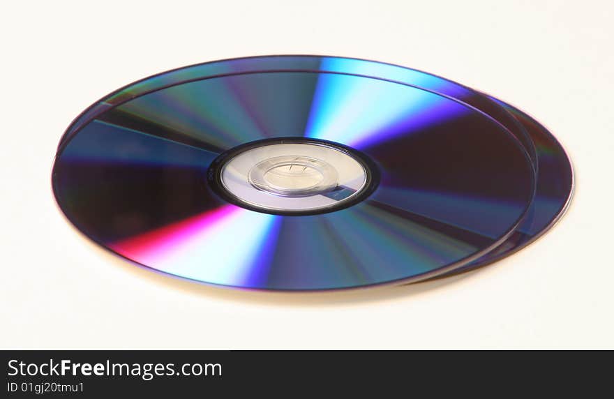 DVD disks isolated over a white background. DVD disks isolated over a white background