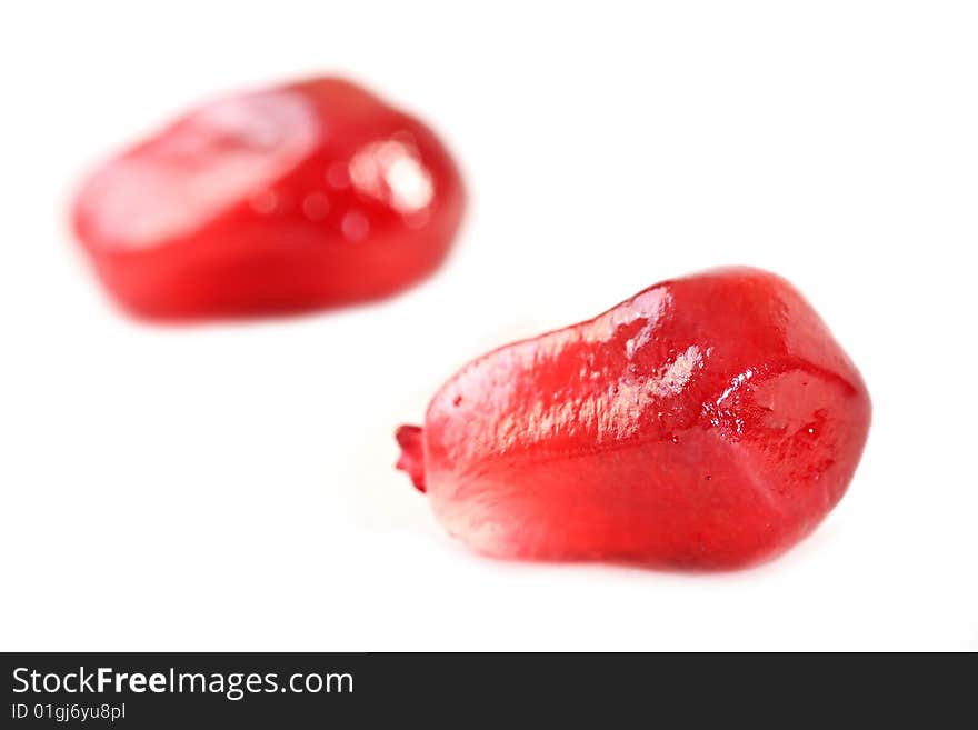 Grains of ripe pomegranate. Macro.