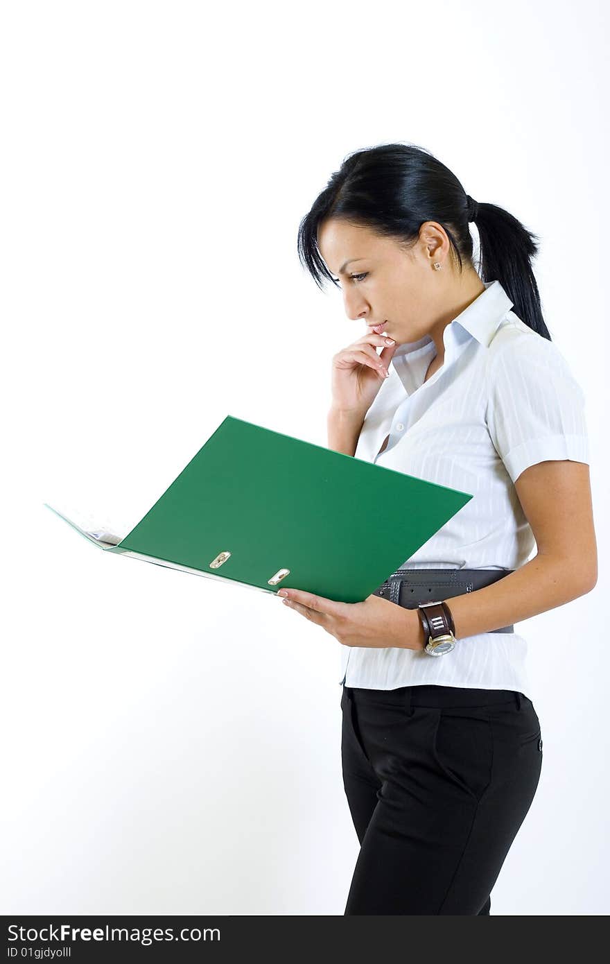 attractive businesswoman holding a folder and reading