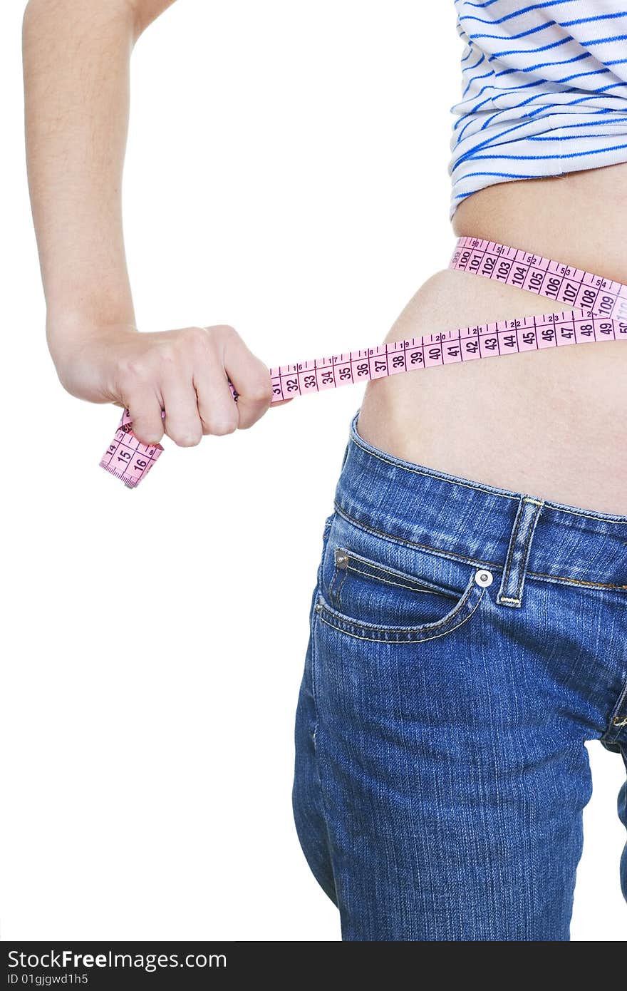 Woman measuring her small waist. Woman measuring her small waist