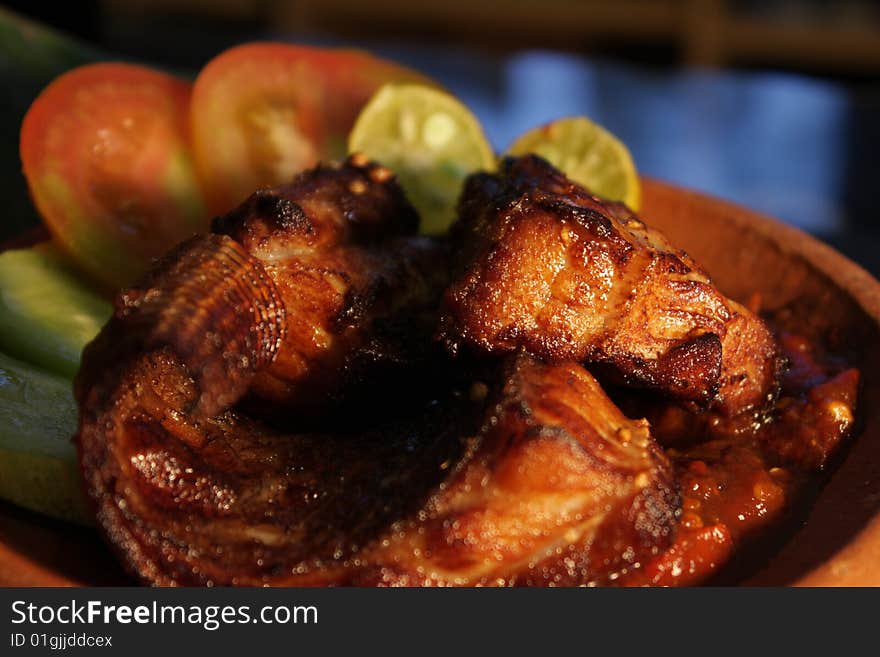 Deep fried Fish served with fresh vegetable and chili paste