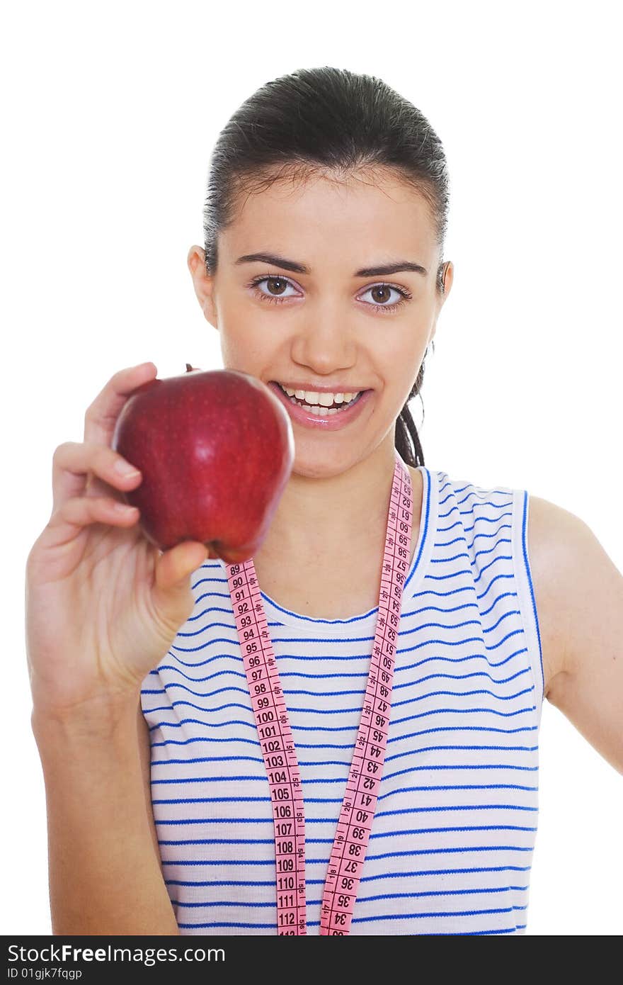 Portrait of cute young woman holding red apple and measuring tape. Portrait of cute young woman holding red apple and measuring tape