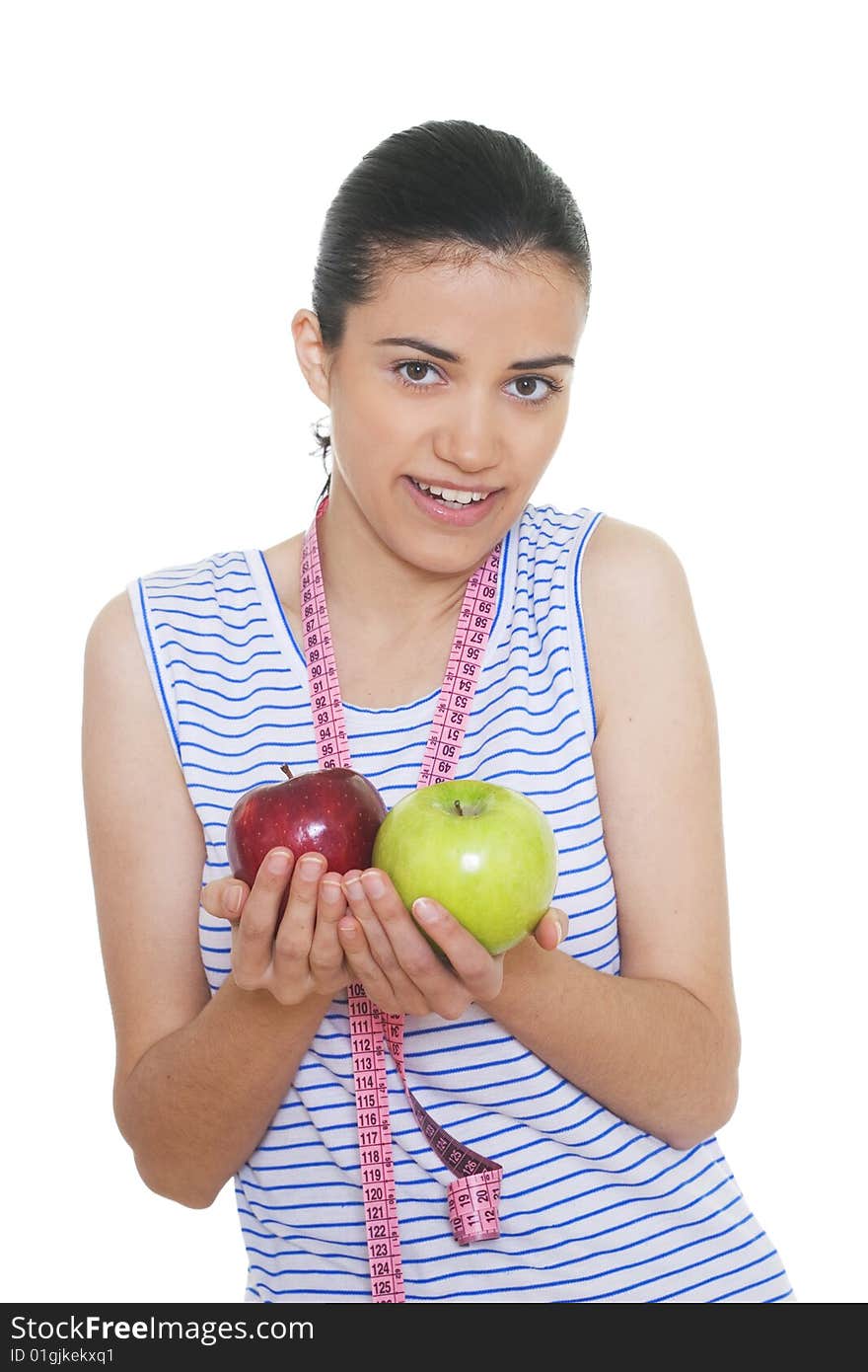 Portrait of cute young woman holding two apples and measuring tape. Portrait of cute young woman holding two apples and measuring tape