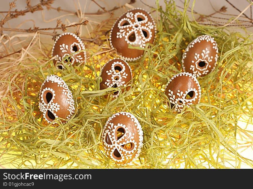 Ornate Easter gingerbread eggs in spring decoration