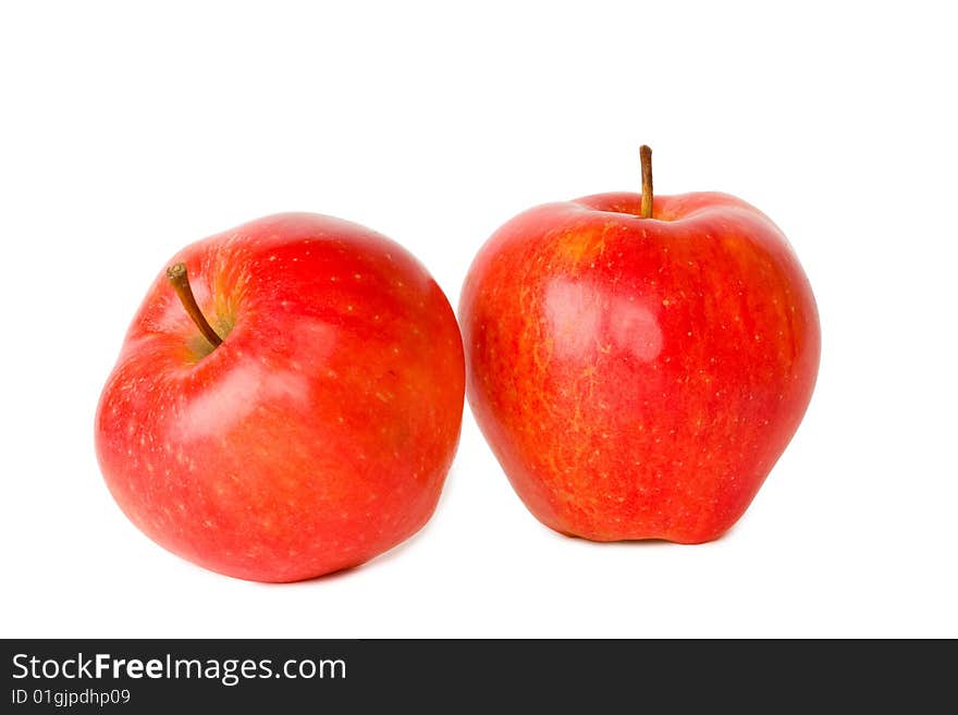 Two red apples isolated on white background