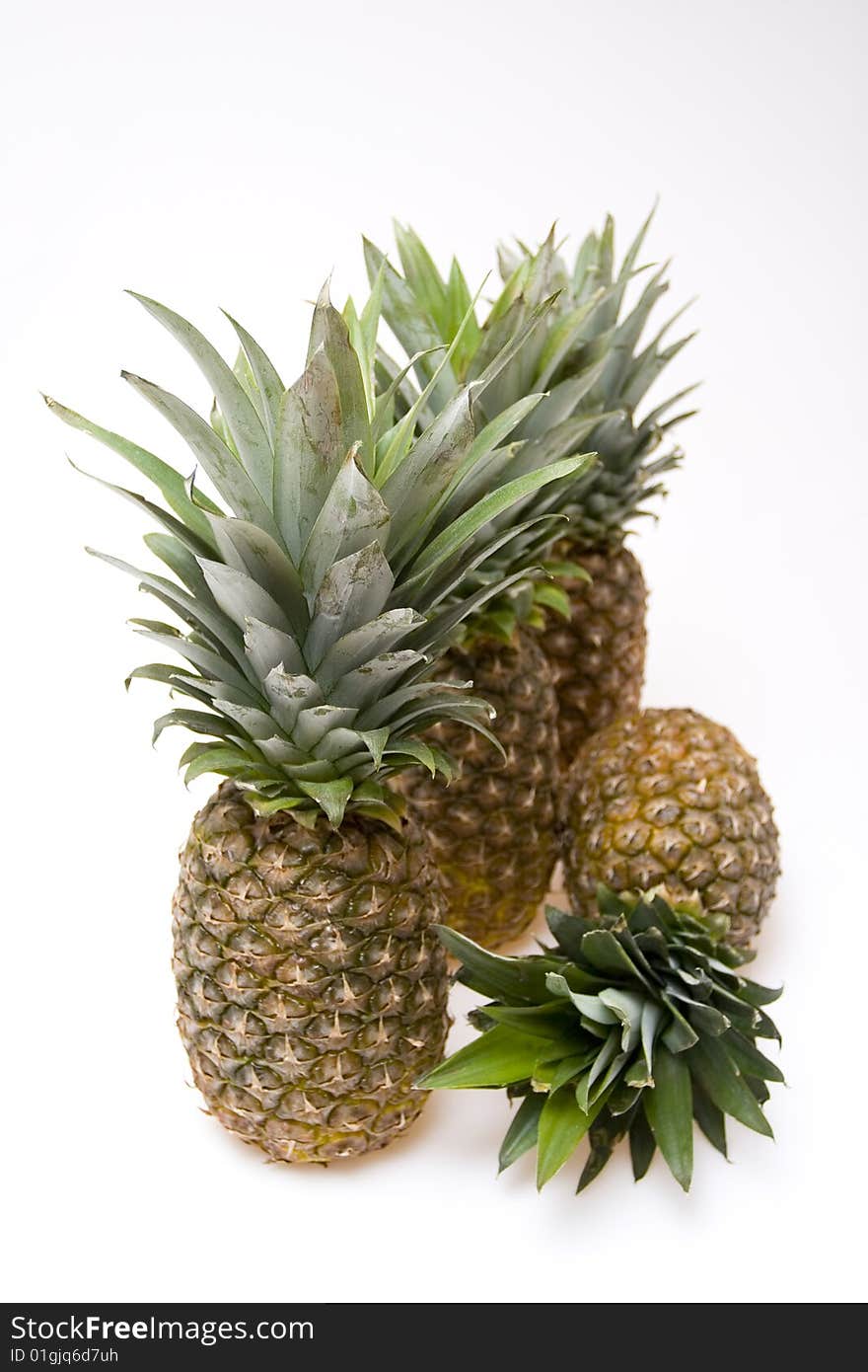 Big pineapples on white background