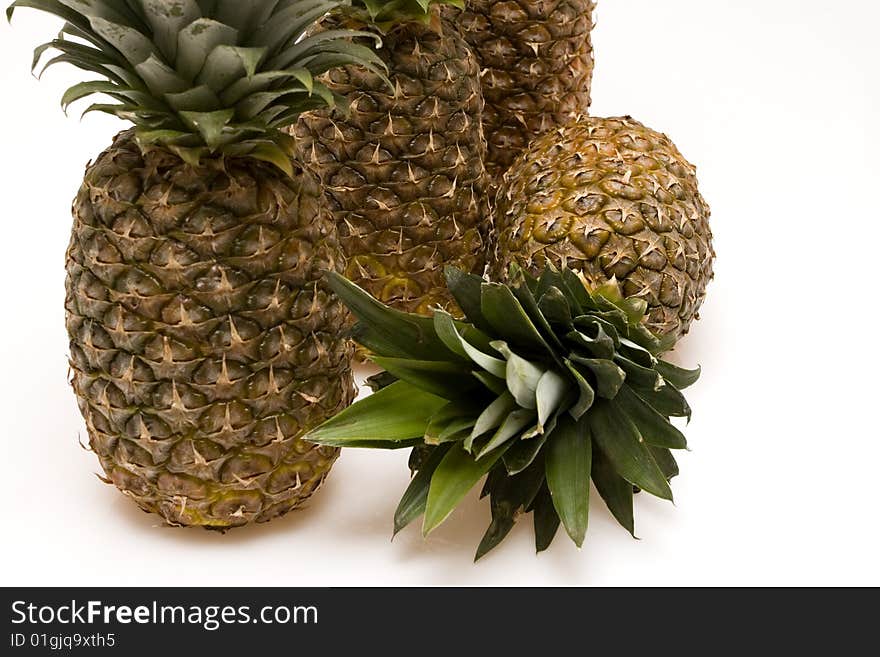 Big pineapples on white background