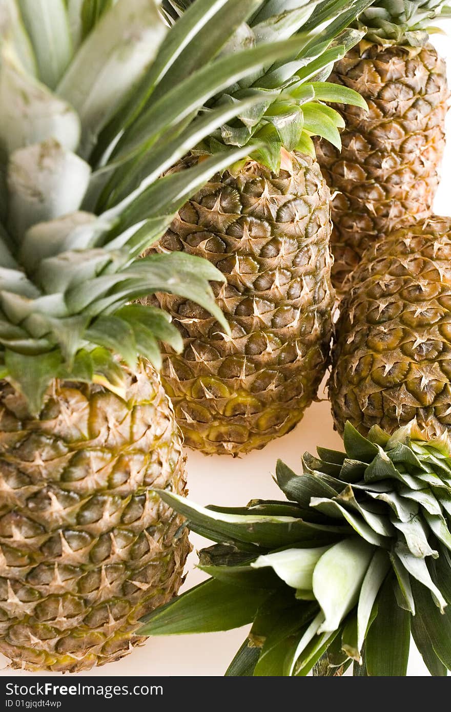 Big pineapples on white background