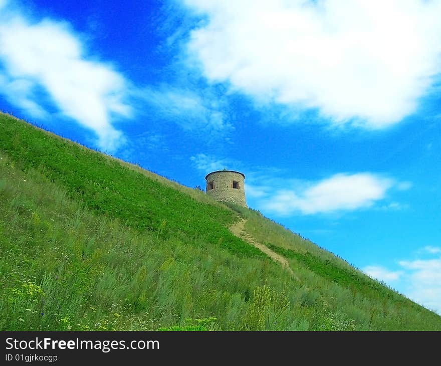 Old castle on green hill