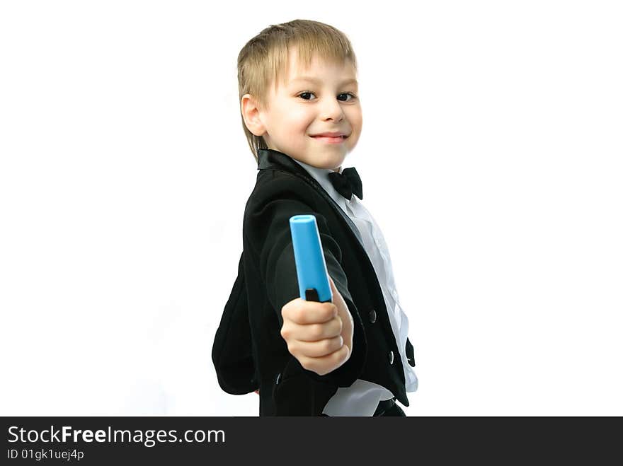 Happy little schoolboy with a felt-tip pen against white background. Happy little schoolboy with a felt-tip pen against white background