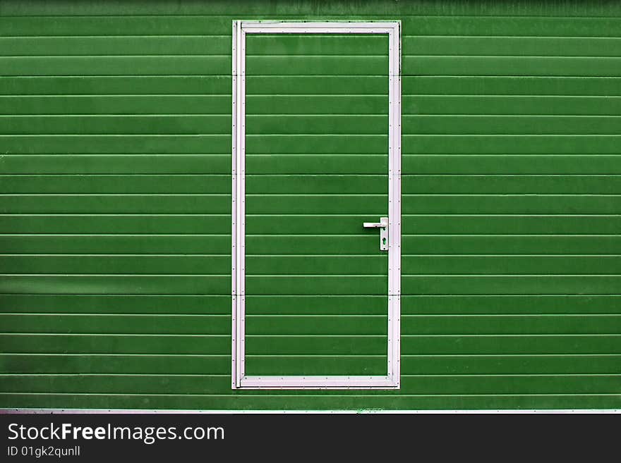 Simple door in colored wall