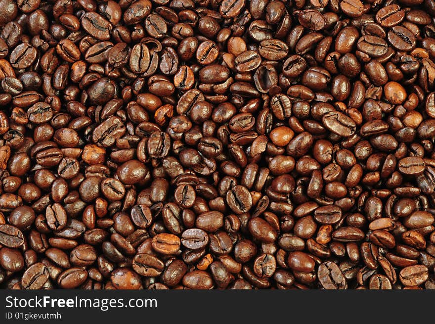 Coffee grains as brown textured background