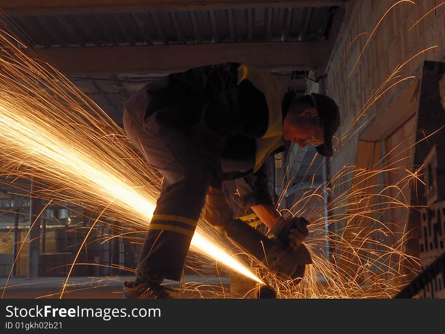 The flame of sparks during construction of one of the city buildings. The flame of sparks during construction of one of the city buildings.