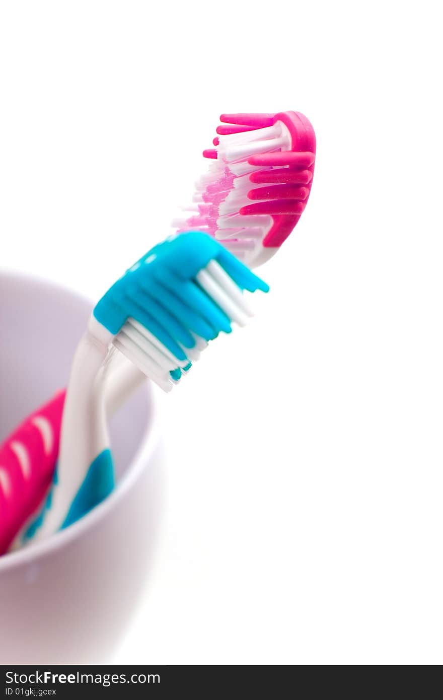 Two toothbrushes on white background