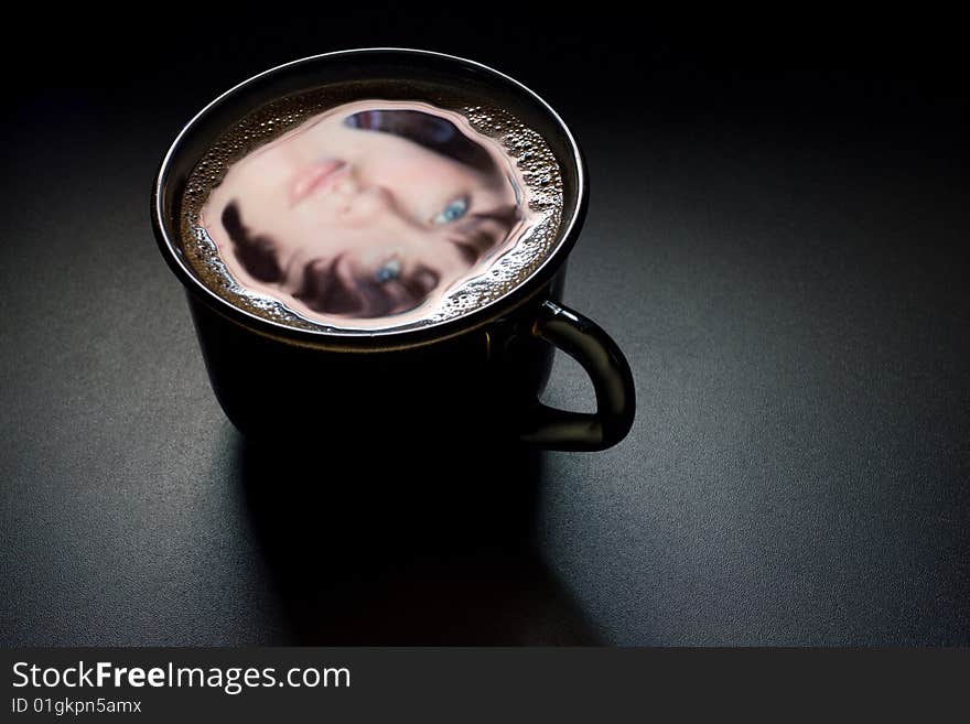 Reflected In A Cup Of Coffee