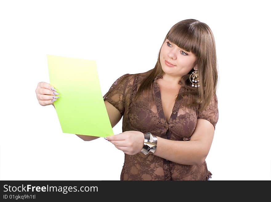 The young beautiful businesswoman at office behind work on a white background. The young beautiful businesswoman at office behind work on a white background