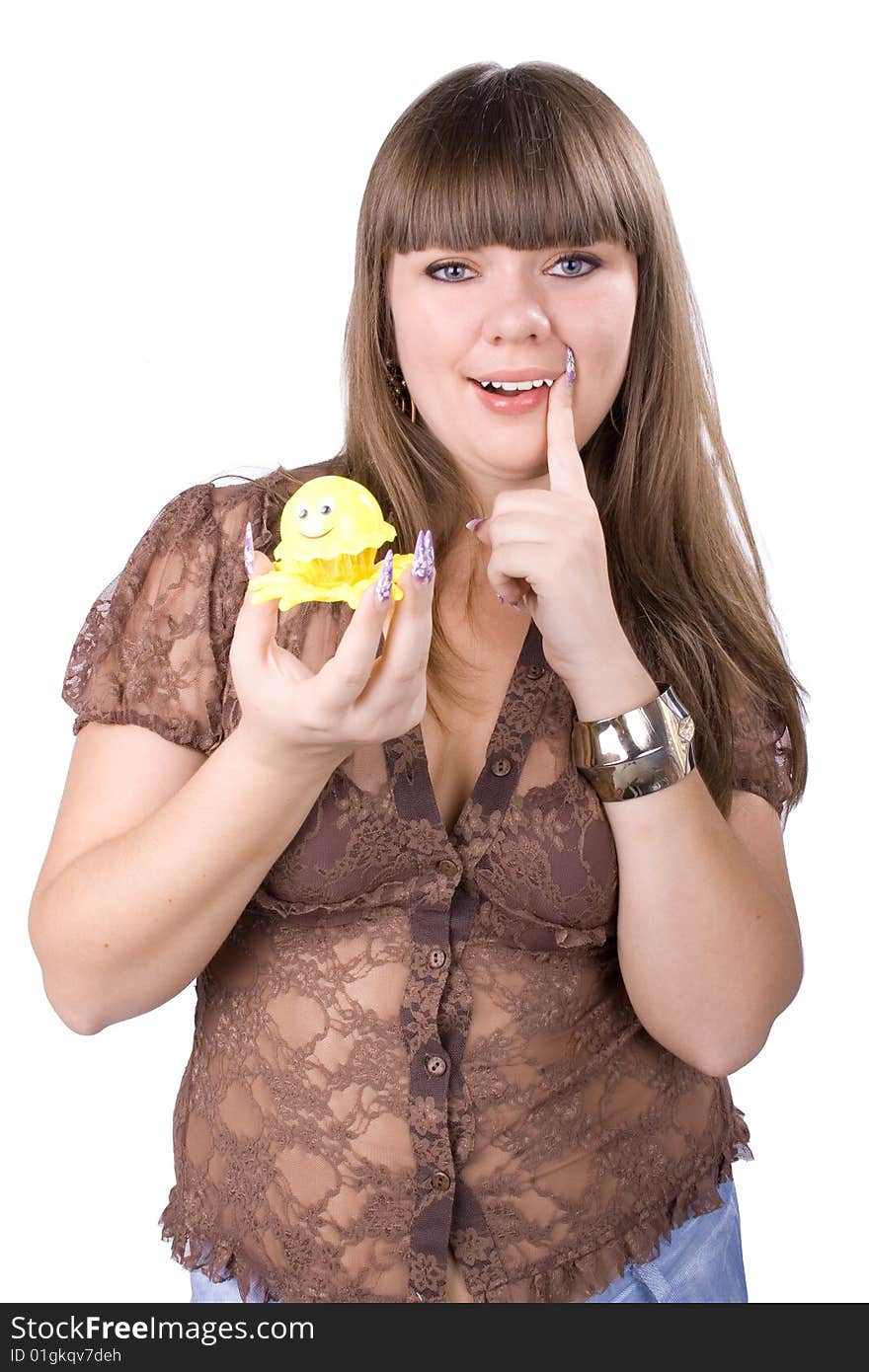 The young beautiful businesswoman at office behind work on a white background. The young beautiful businesswoman at office behind work on a white background