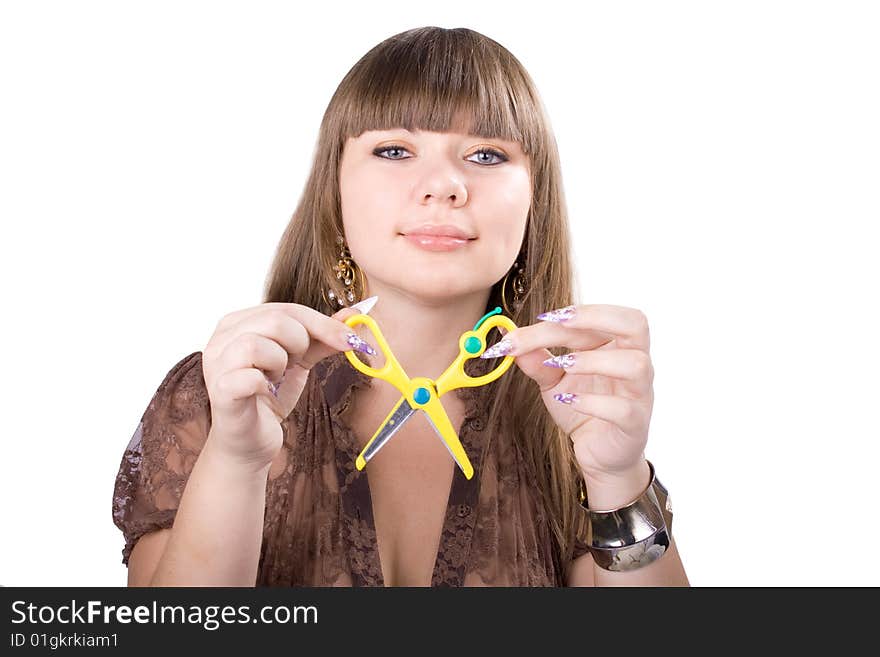 The young beautiful businesswoman at office behind work on a white background. The young beautiful businesswoman at office behind work on a white background