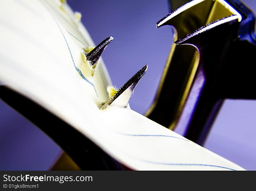 Staple remover tearing at a piece of paper