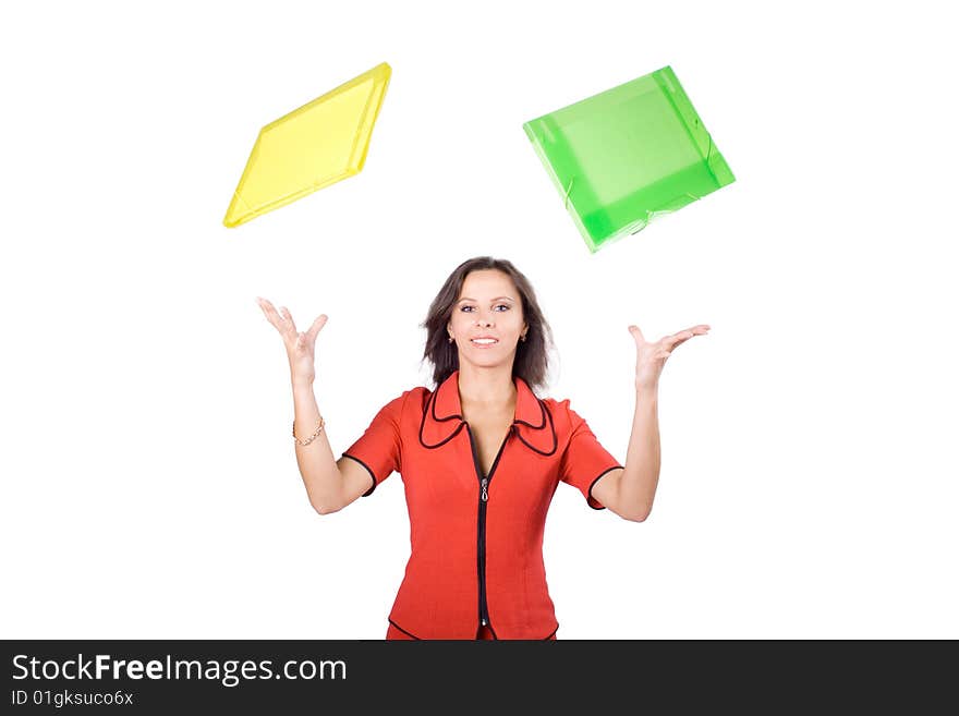 The young beautiful businesswoman at office behind work on a white background. The young beautiful businesswoman at office behind work on a white background