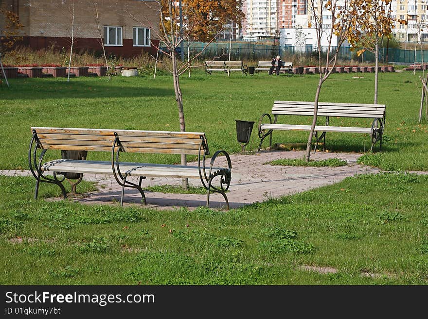 Two benches - vacation spot. Russia, Moscow.