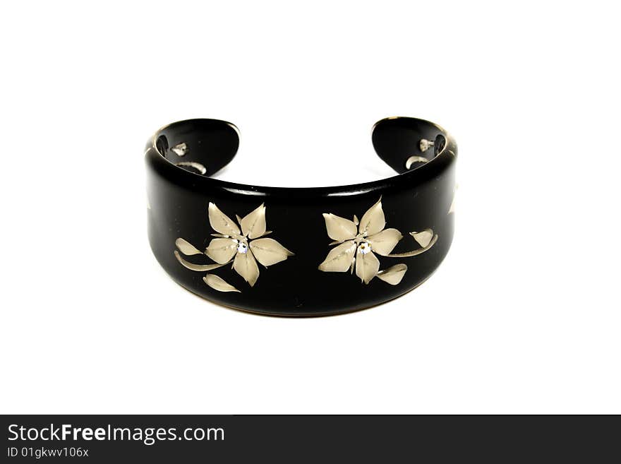 Black bracelet with decoration from flowers and gems