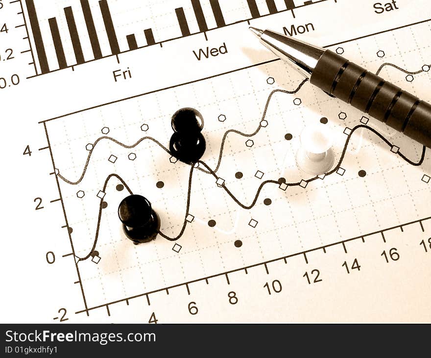 Pen and drawing-pins against the chart, in sepia. Pen and drawing-pins against the chart, in sepia.