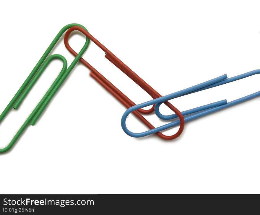 Three paper clips isolated on white background. Three paper clips isolated on white background