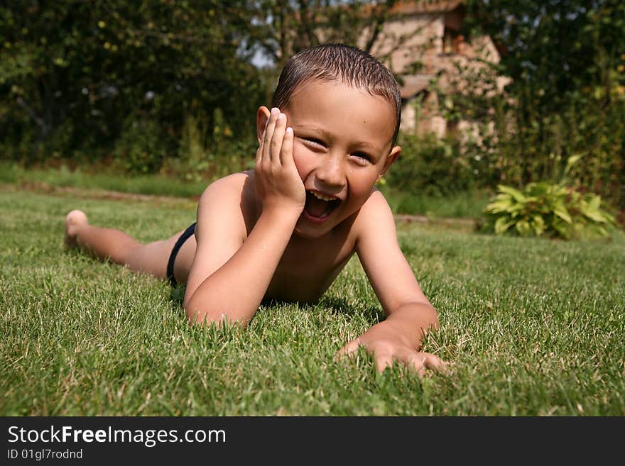 Boy In Green Grass