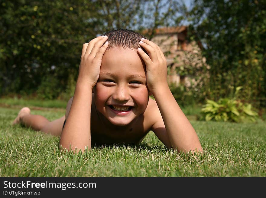 Boy in green grass