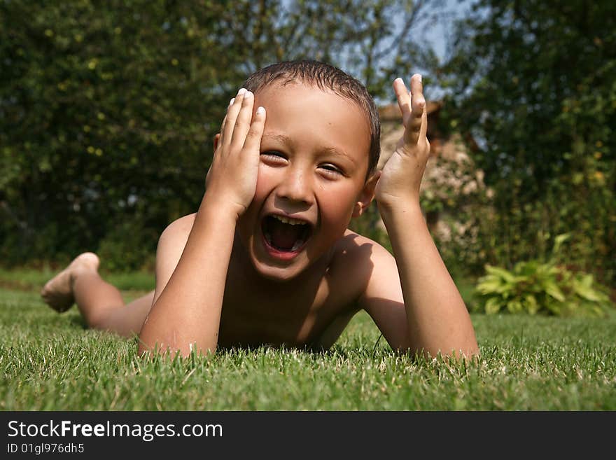 Boy in green grass