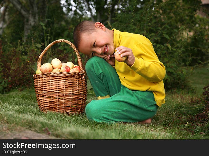 Boy with apples