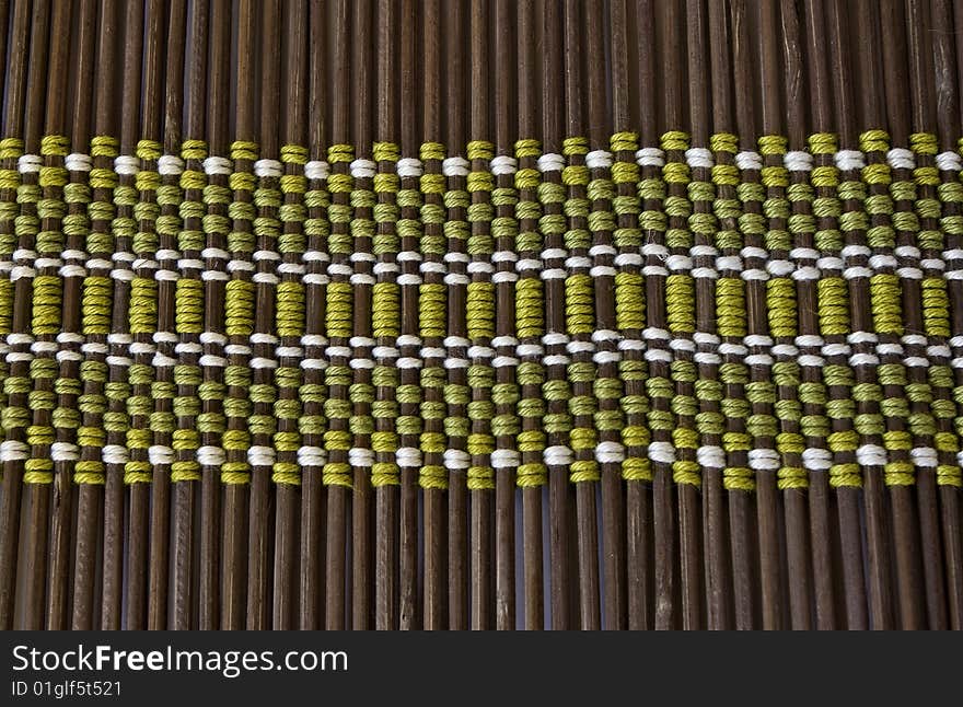 Woven background. Mat made out of bamboo pieces