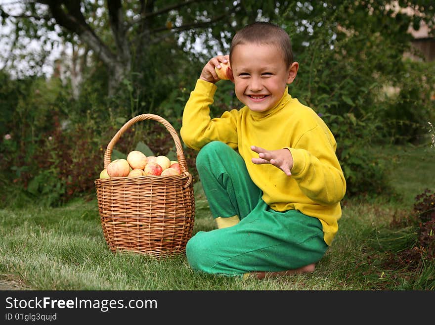 Boy with apples