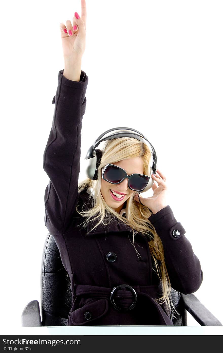 Front view of pointing woman enjoying music