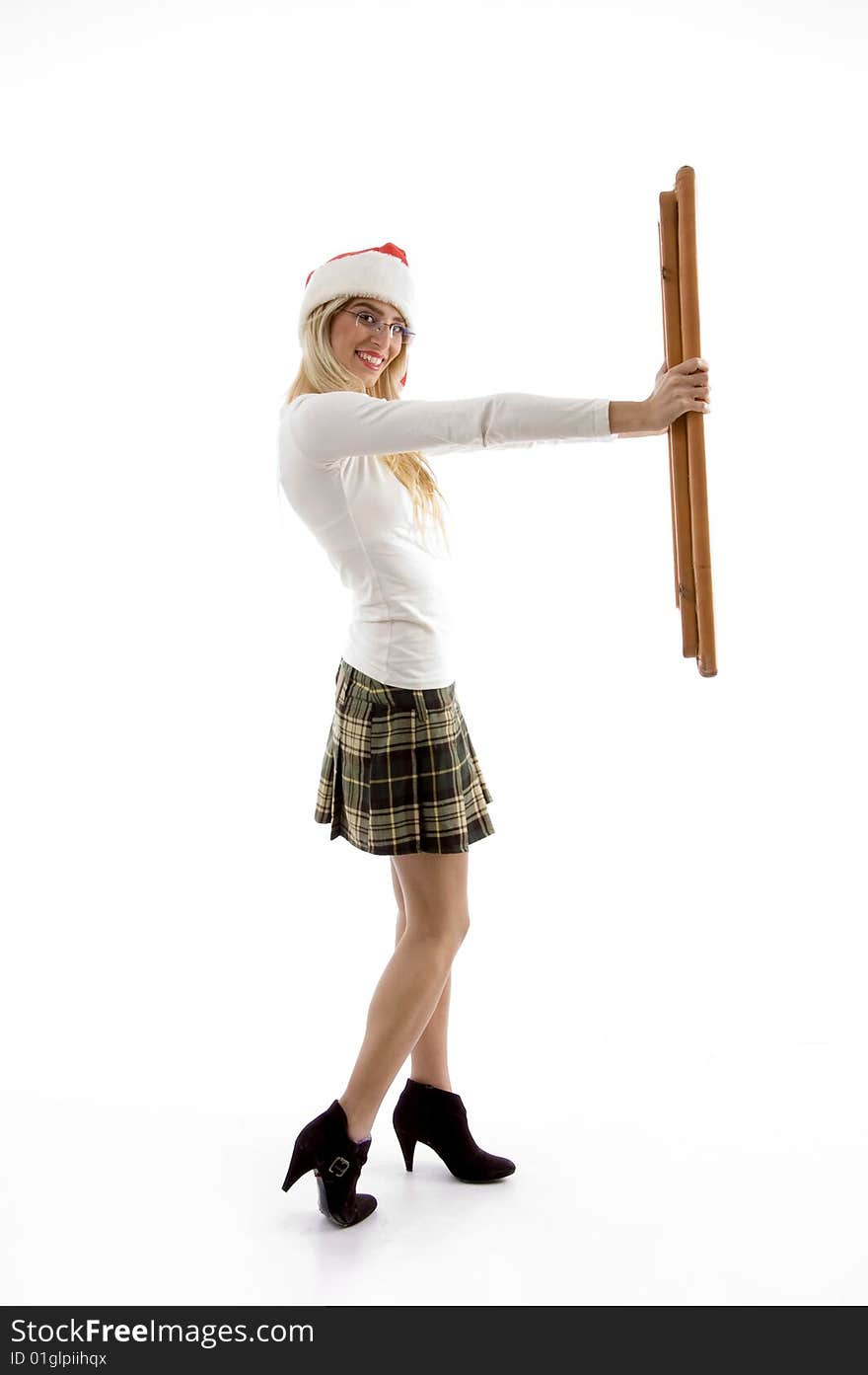 Side view of happy female holding frame on an isolated background