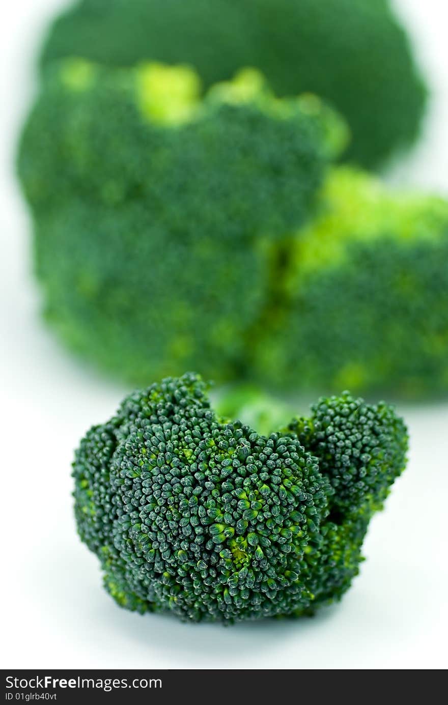 Green fresh broccoli food isolated on a white background.