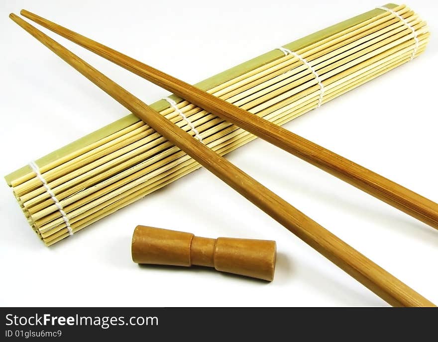 Two chinese sticks with bamboo cloth