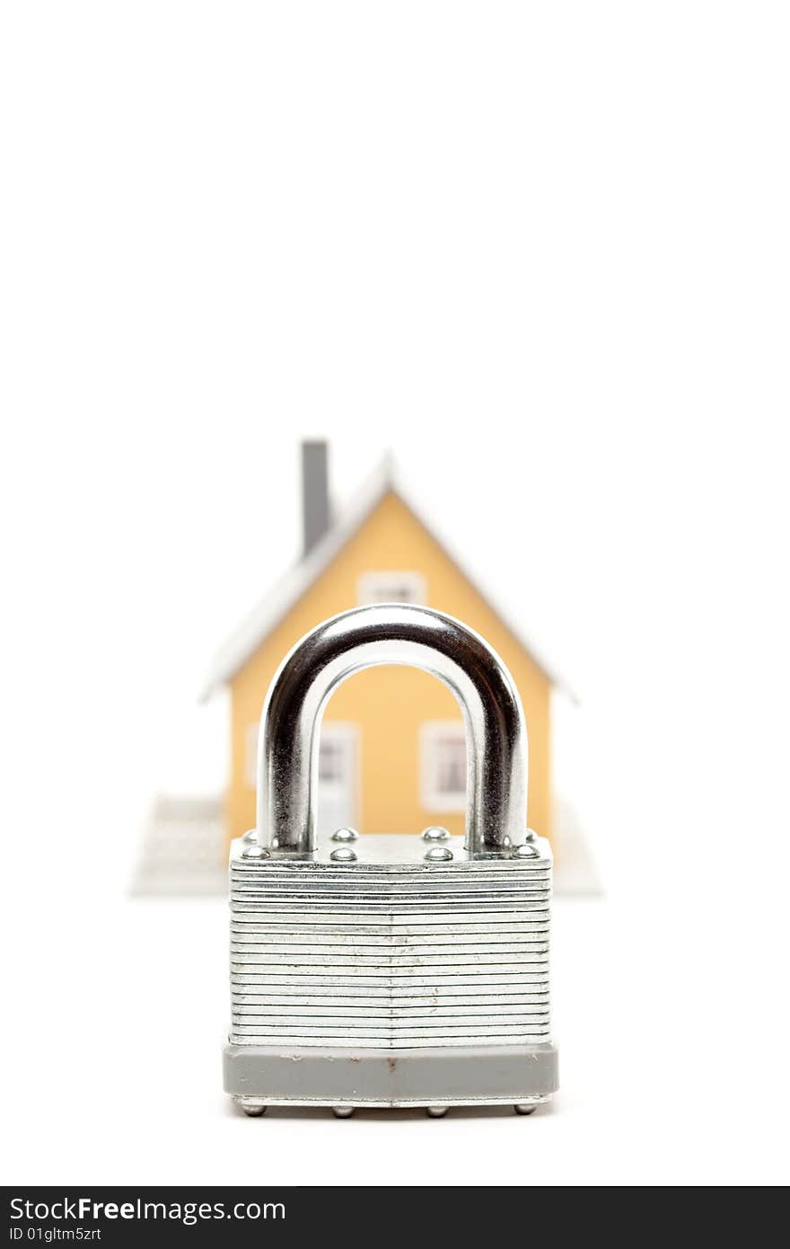 Lock and House Isolated on a White Background.