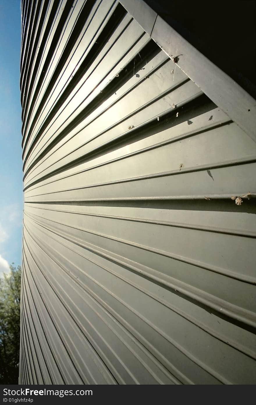 Detail of a metal striped facade. Detail of a metal striped facade