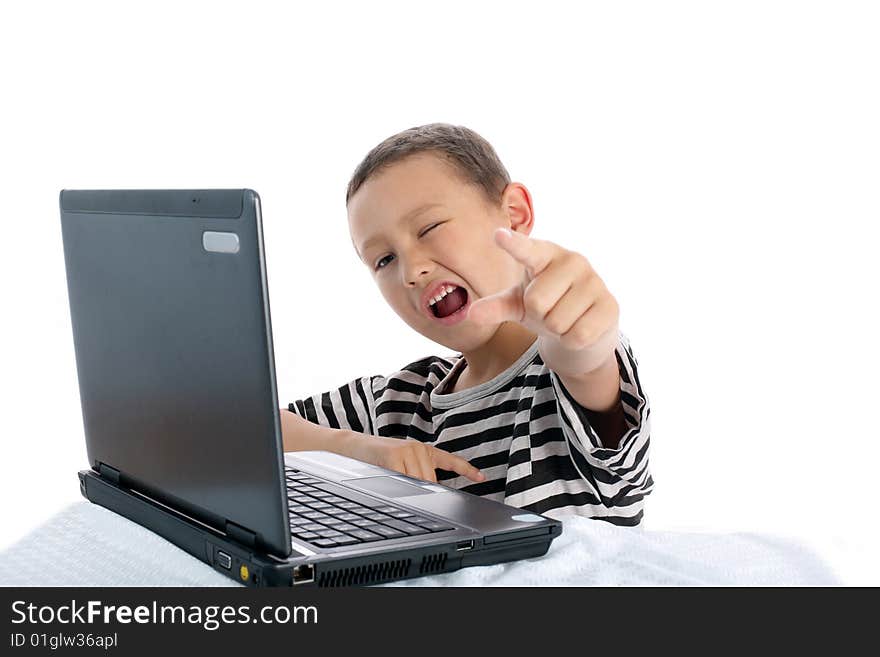 Little boy with laptop isolated on white. Little boy with laptop isolated on white