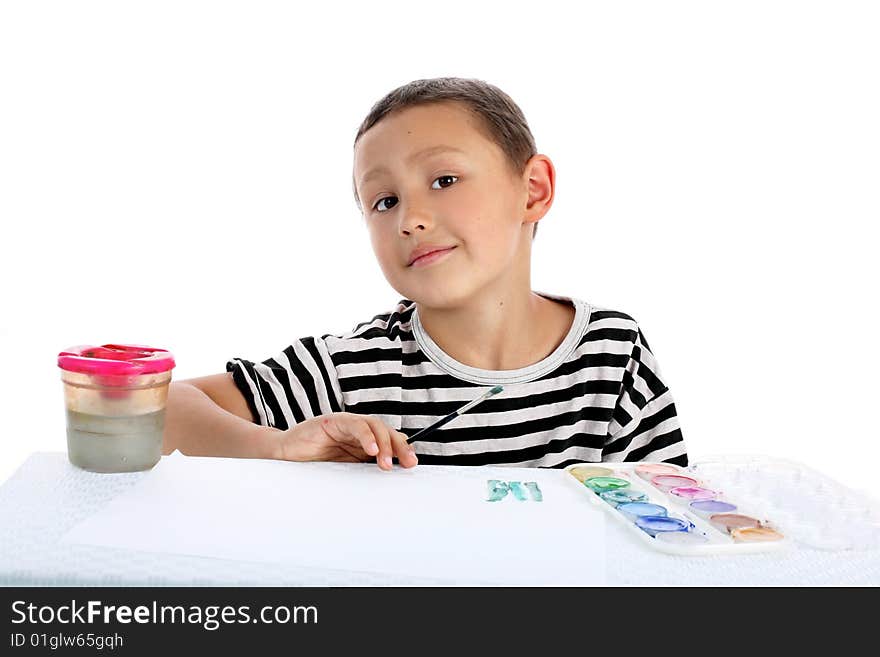 Little boy with paint isolated on white