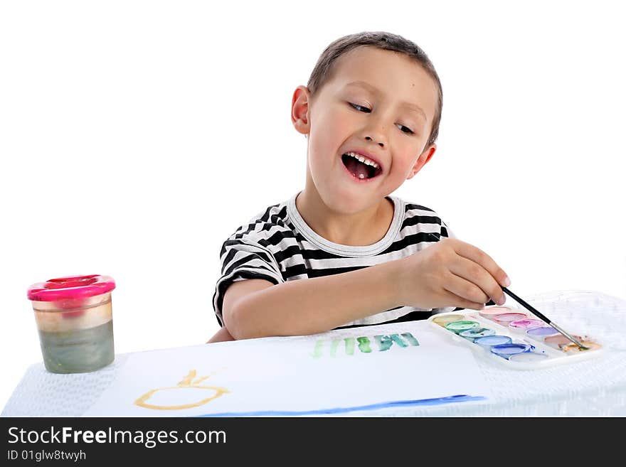 Boy draw a picture isolated on white