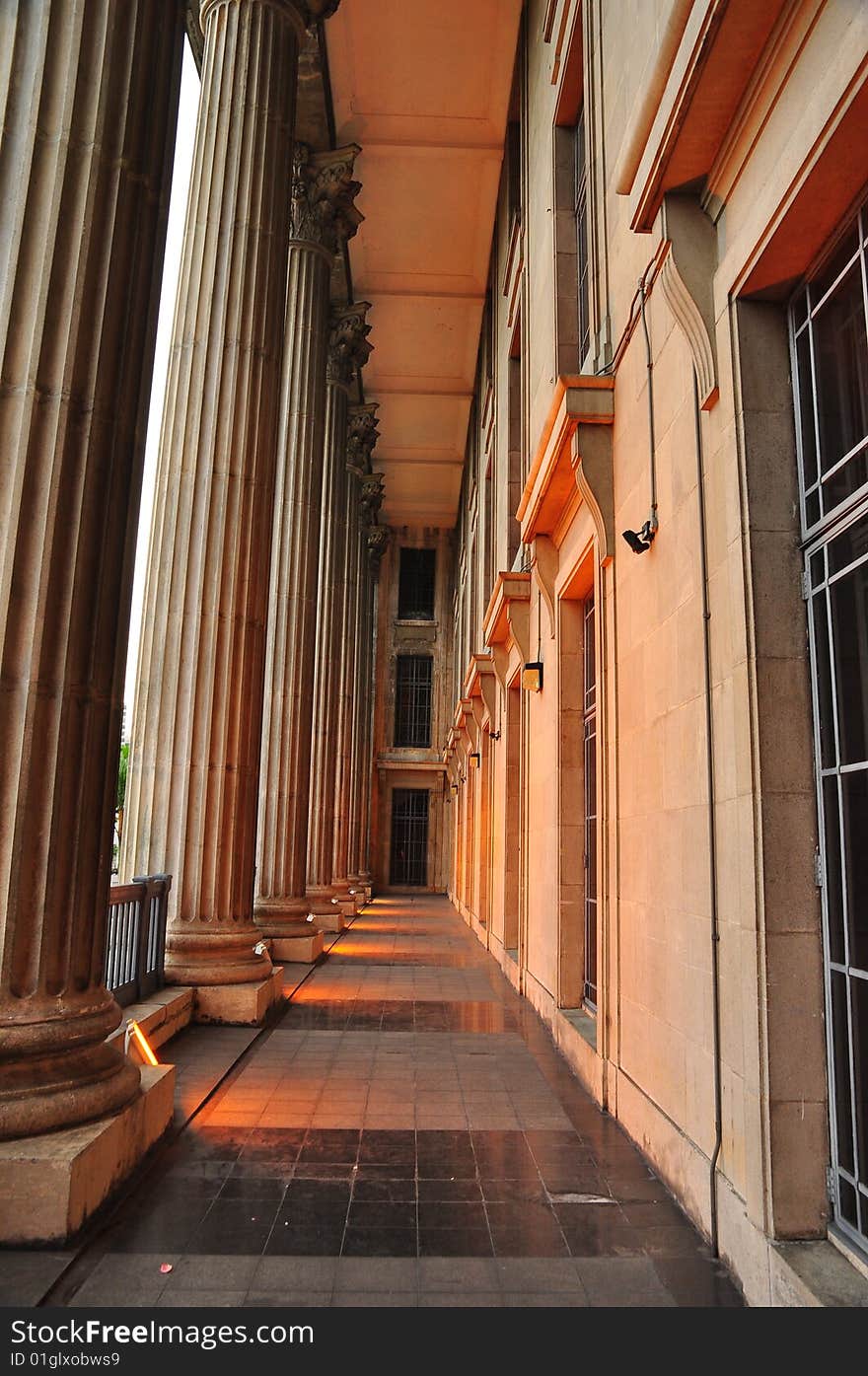 Image of pillars and the corridor of a historic building, popular for tourist attractions. Image of pillars and the corridor of a historic building, popular for tourist attractions.