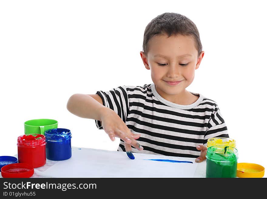 Boy with paint isolated on white