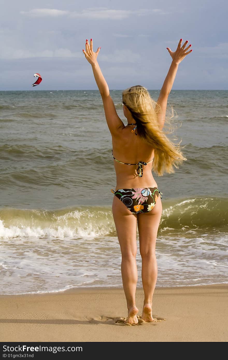 Young long hair blonde woman on a beach. Young long hair blonde woman on a beach